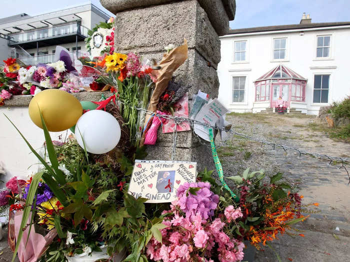 Many fans laid tributes at the address.