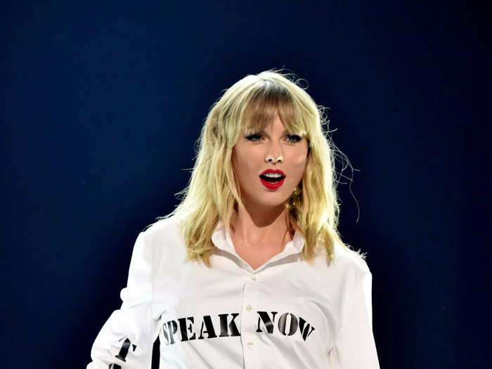 At the end of 2019, Swift began using her outfits more boldly to make statements — like a button-up top covered with the names of her earliest albums, which she was fighting to purchase the rights to.