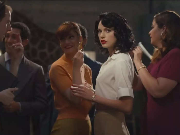 She went for a completely different look with dark curls and a vintage wardrobe in the "Wildest Dreams" music video.