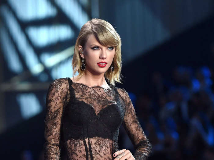 Swift wore a sparkly black bra and matching shorts to perform at the Victoria