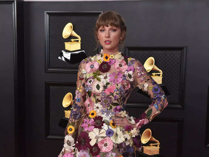 For the 2021 Grammys, Swift wore another floral dress designed by Oscar de la Renta.