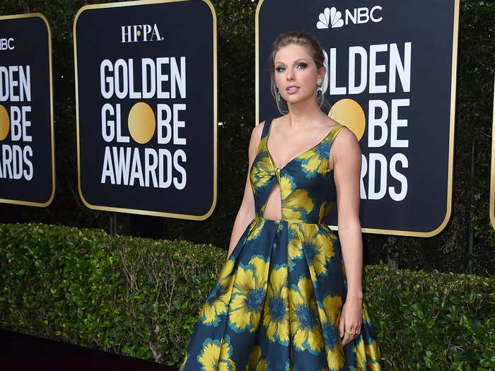 She wore a floral dress with a triangular cutout to the 2020 Golden Globe Awards.