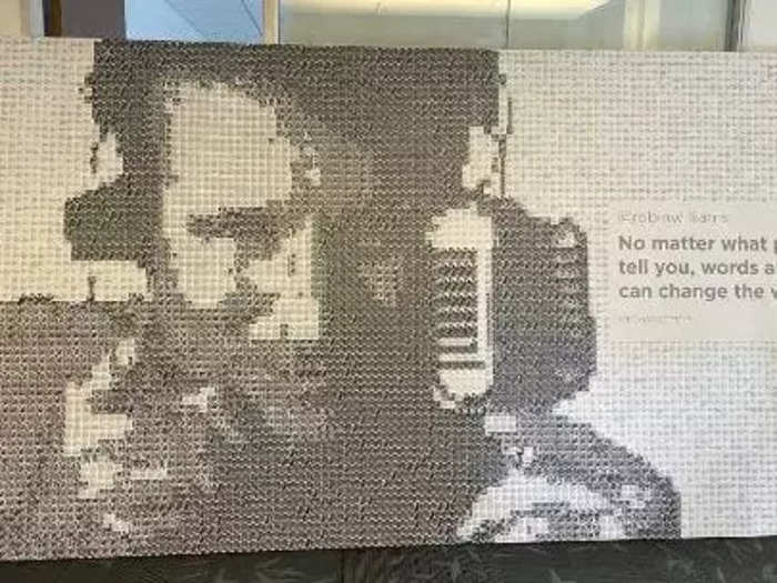 This is a mosaic of Robin Williams. It includes a quote from him and is made up of celebrity tribute tweets after Williams