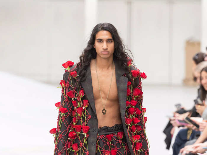 Rolf Ekroth sent a model down the runway with real roses slotted into a net-overlay suit.