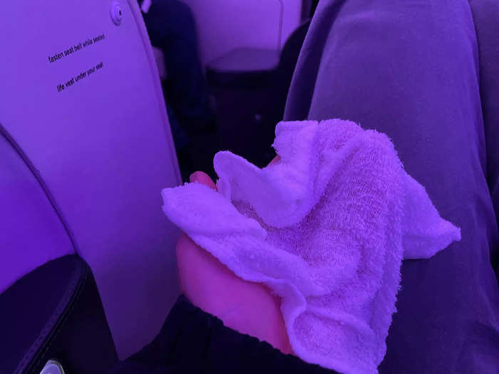 The meal service in business class also had perks my economy seat did not. Each passenger was given a steamed towel to wipe their hands and face.