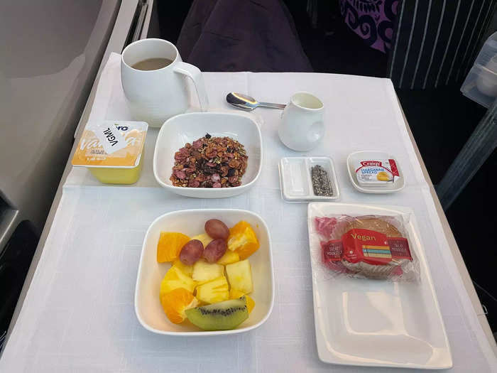 It was a similar case with the tray tables. In business class, I fit both food and my laptop on the large tray table.