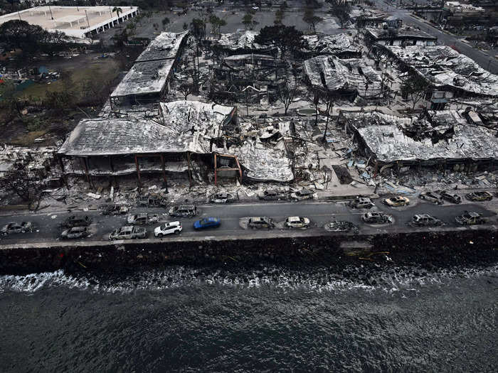 In Lahaina, the wildfires destroyed buildings, cars, and local greenery, forcing residents to flee the area.