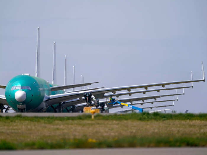 At over 235 feet long, the wings stretched too wide — so Boeing added a system that folds the wingtips up when parked at the gate.