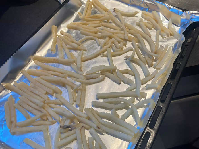 Next, I laid a layer of fries on a baking sheet to put in the oven.