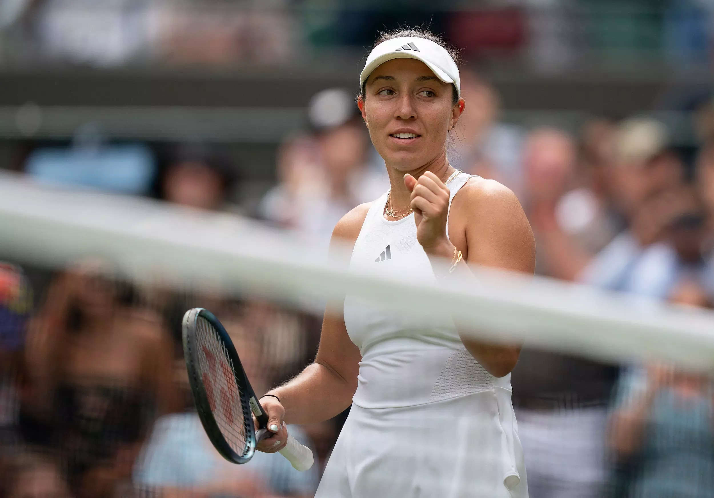 Jessica Pegula smiles and pumps her fist during a 2023 Wimbledon match.