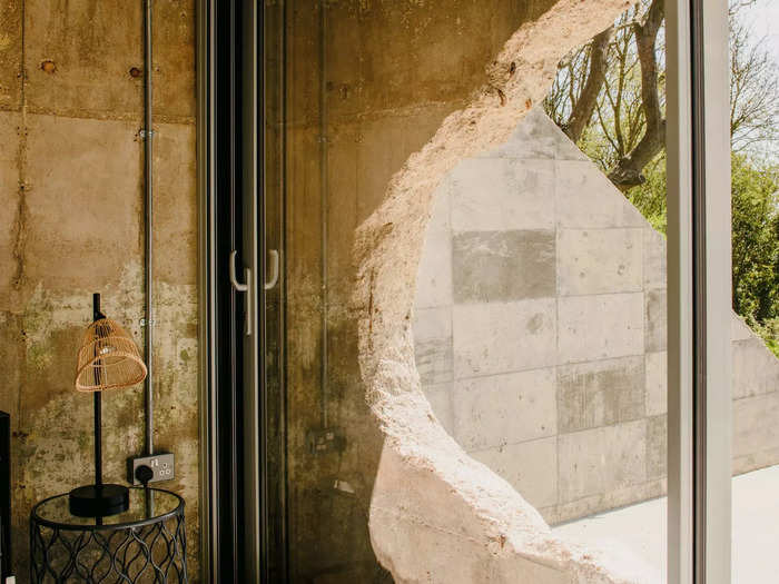 Exposed concrete walls are also part of the effort to maintain its historical character.