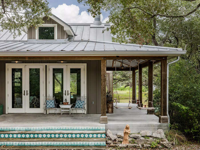 In addition to its interior square footage, about 2,500 square feet of covered patio surrounds the residence.