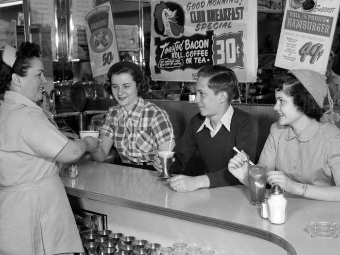 Diners became popular due to their large menus featuring American food staples like hamburgers, fries, and club sandwiches.