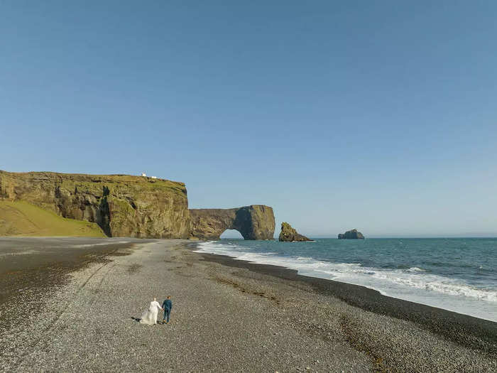 For their last stop before dinner, Peters used a drone to capture photos of Schofield and Watson on a private black-sand beach.