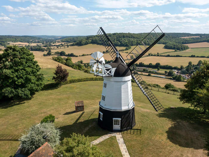 The windmill has two bedrooms, a bathroom, and a reception room.