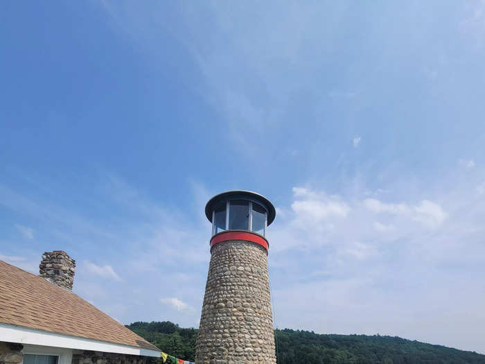 Steps away from the tiny home is the stone lighthouse. It