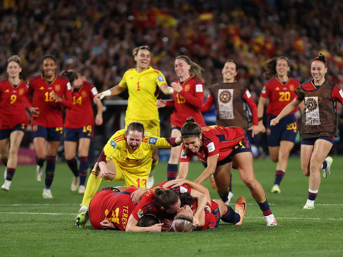 Players rushed onto the field to celebrate the team