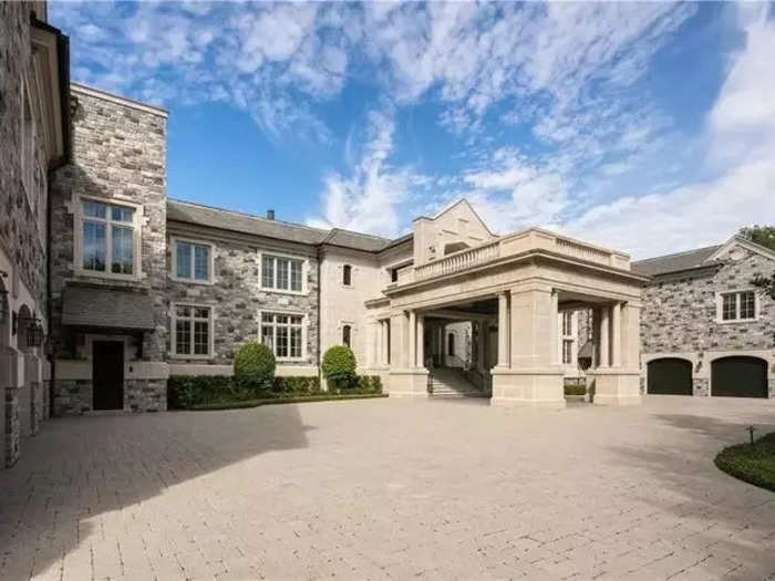 There was garage space for six cars and a majestic roundabout driveway out front.