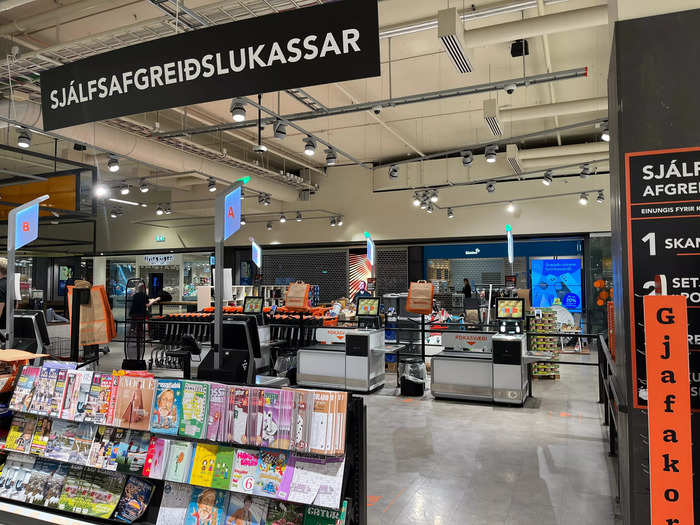 Hagkaup had both self-checkout and staffed cashiers. Magazines and candy at the checkout appeared to be a universal phenomenon, regardless of country.