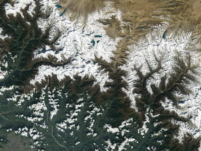 Few mountain ranges compare to the snow-covered Himalayas: The range is visible hundreds of miles above Earth