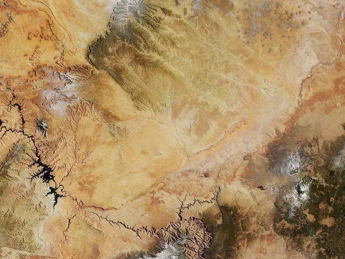 To astronauts, the Grand Canyon resembles a long, flowing river at 277 miles long, 18 miles wide, and more than a mile deep in some places. They