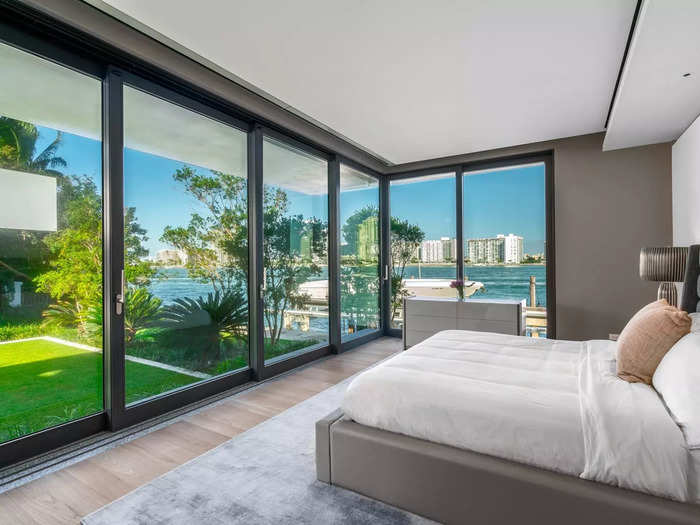 Another bedroom provides views of the water, as well as the property