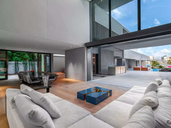 Inside, the modern house comprises almost 19,000 square feet, with another 4,000-square-foot guest house on the property.