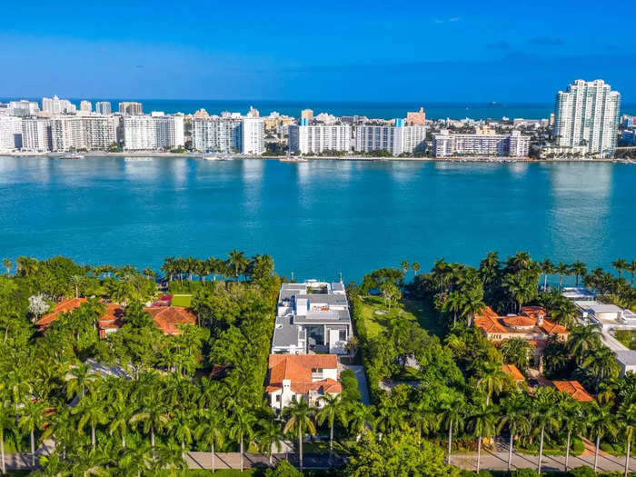 The property, 27 Star Island Drive, looks out onto the blue waters of Biscayne Bay, with Miami Beach as a backdrop.