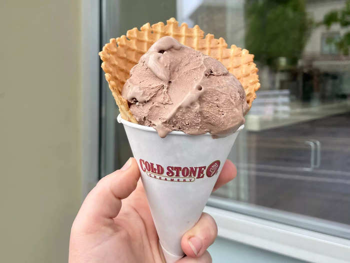 The scoop of chocolate ice cream came in a huge cone.