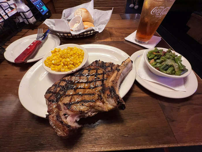 My medium-rare bone-in rib eye arrived quickly, with servings of corn and green beans on the side.