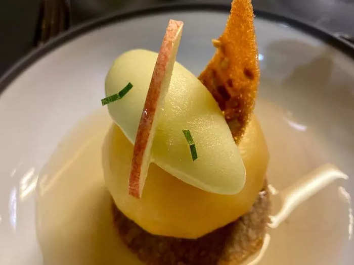 The baked apple with a cookie was available for dessert on both menus.