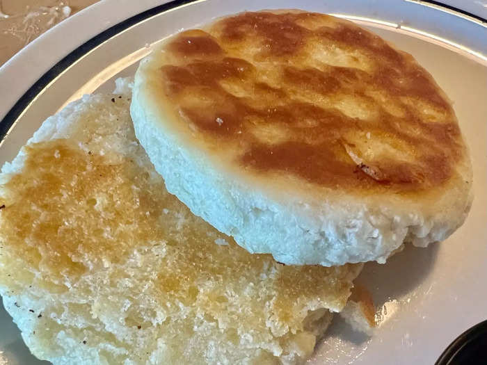 The a la carte buttermilk biscuit was saturated in butter and looked like it had been toasted on a flattop grill.