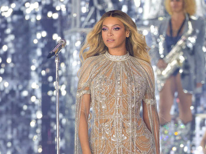 During a show in Warsaw, Poland, Beyoncé wore a heavily embellished Elie Saab Haute Couture minidress with fringe details.