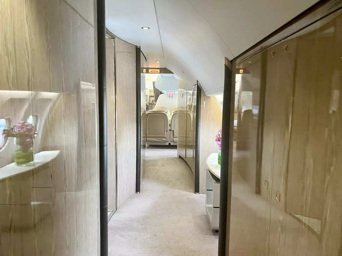 Starting at the front of the jet, customers will enter and turn right into a narrow hallway that leads to the various seating options onboard.