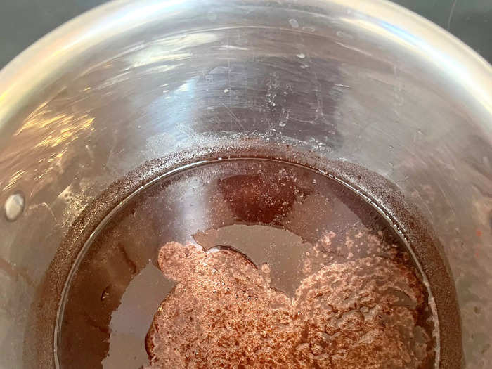 The Coca-Cola created a noticeable layer of bubbles at the top of the hot mixture.