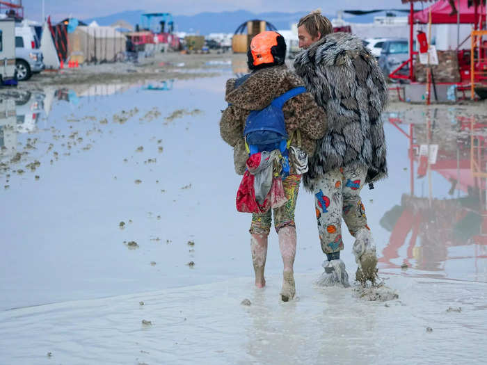 Many festival goers were left stranded as organizers said the roads remained too wet to leave by vehicle.