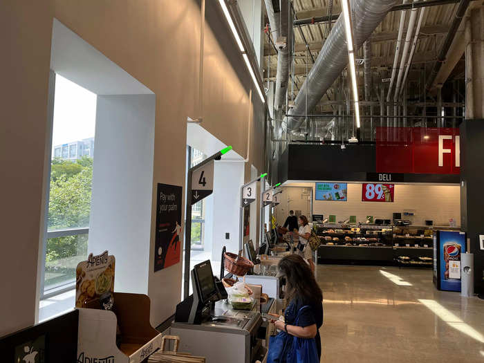 After walking up the stairs inside of the side entrance, I saw this bank of self-checkout kiosks.