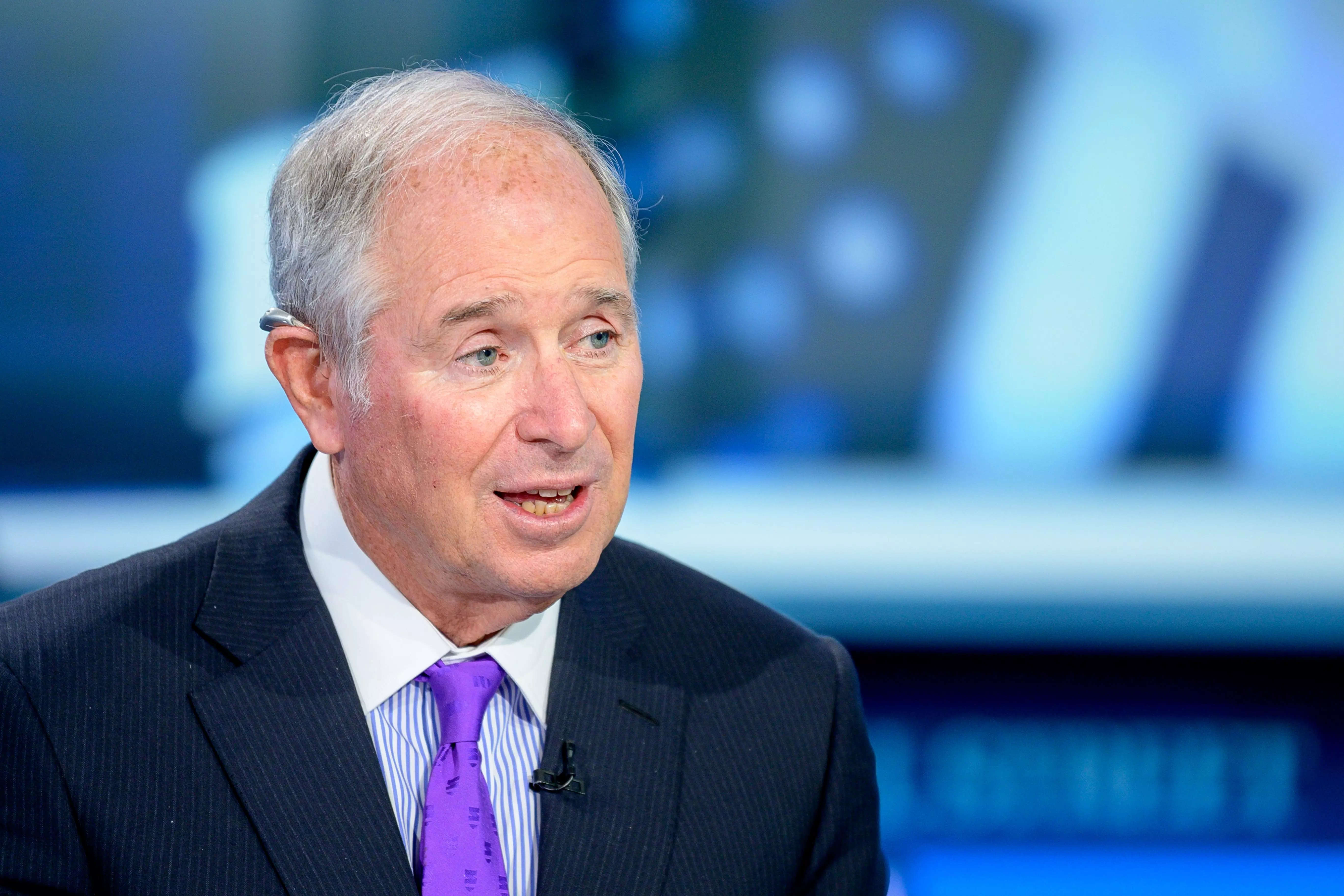 Blackstone CEO Stephen Schwarzman in front of a blue background as he visits "Maria Bartiromo
