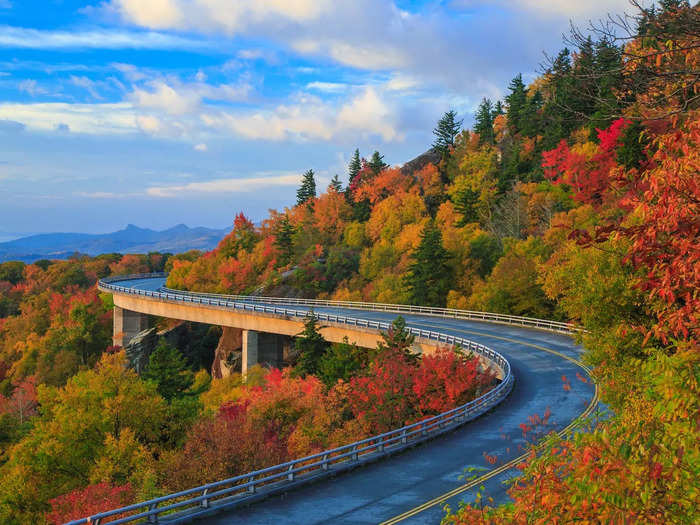 The Blue Ridge Parkway winds through Virginia and North Carolina with vibrant autumn colors.