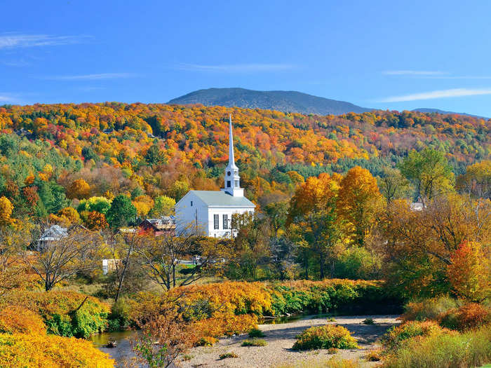 The mountains surrounding Stowe, Vermont, burst with bright colors in the fall.