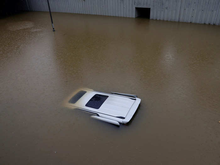 Other car owners had their vehicles almost wholly submerged.