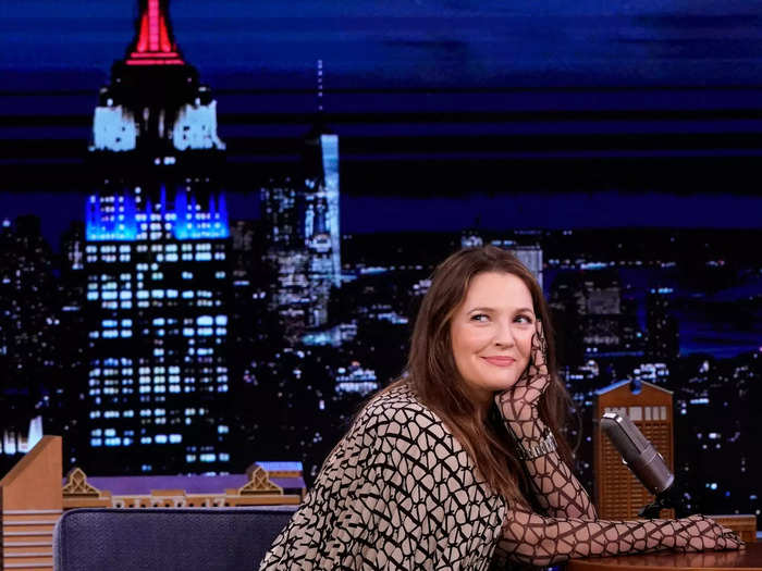 Appearing on "The Tonight Show Starring Jimmy Fallon," Barrymore paired a patterned dress with a fishnet bodysuit in April 2023.