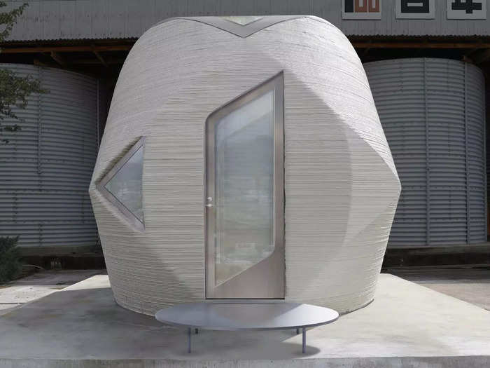 Its first uniquely globular building, pictured below, was printed in March 2202.