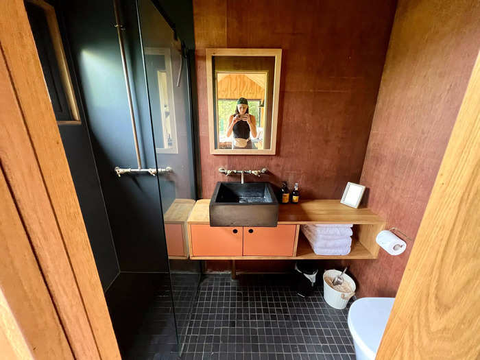 My first impression of the bathroom, accessible behind a pocket sliding door, was that it was much more sleek and modern than I anticipated. It was also well stocked with clean towels, plenty of toilet paper, soap, and shower gel.