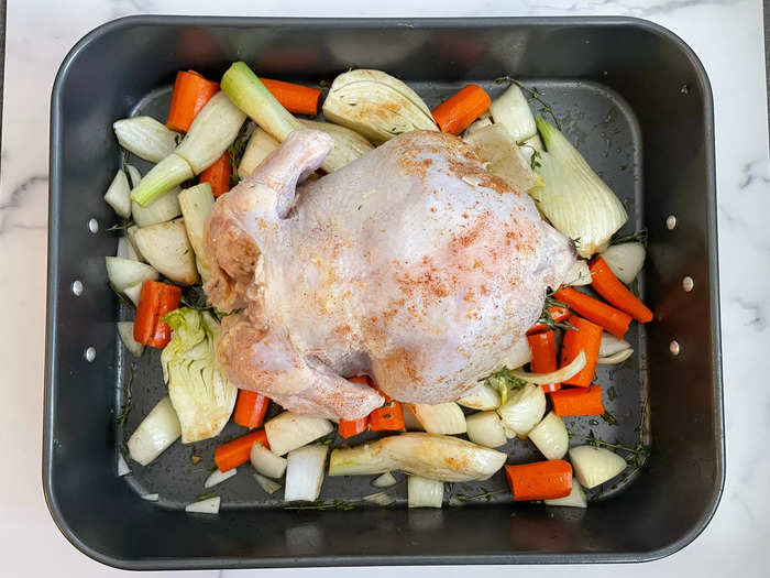 I seasoned and stuffed the chicken before putting it in the oven.