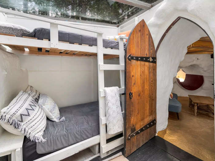 The bunk room has two beds with a tempered glass ceiling for stargazing, according to the listing.