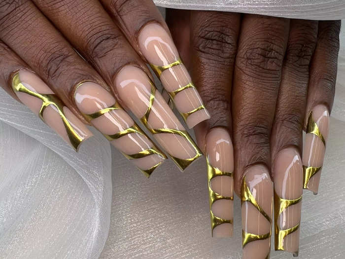 Variations on chrome nails are continuing to trend for fall.