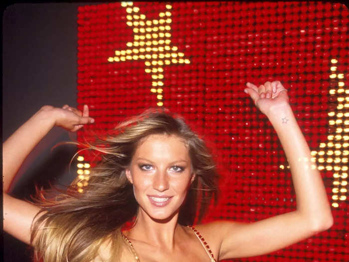 Gisele Bündchen modeled the "Red Hot Fantasy Bra" to close the year in 2000.