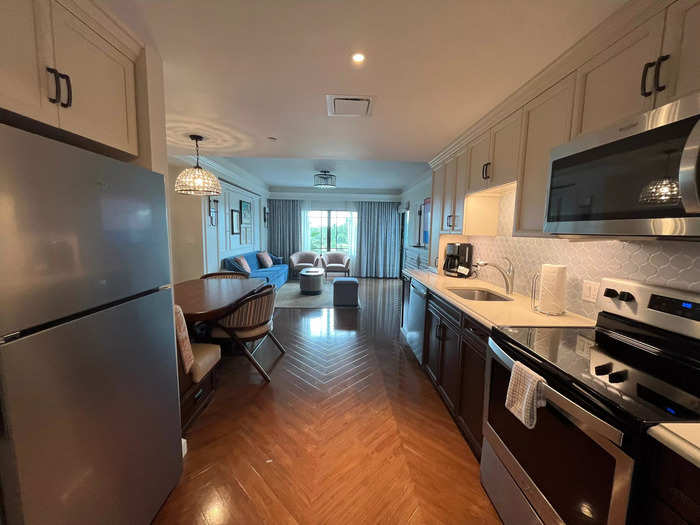 The entryway led into the large kitchen, dining room, and living room.