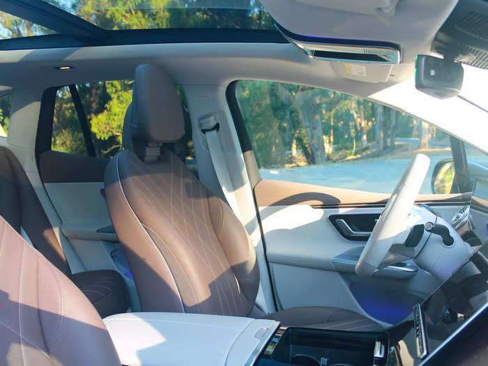 Thanks to the glass roof and some clever design decisions, the EQE feels spacious inside.